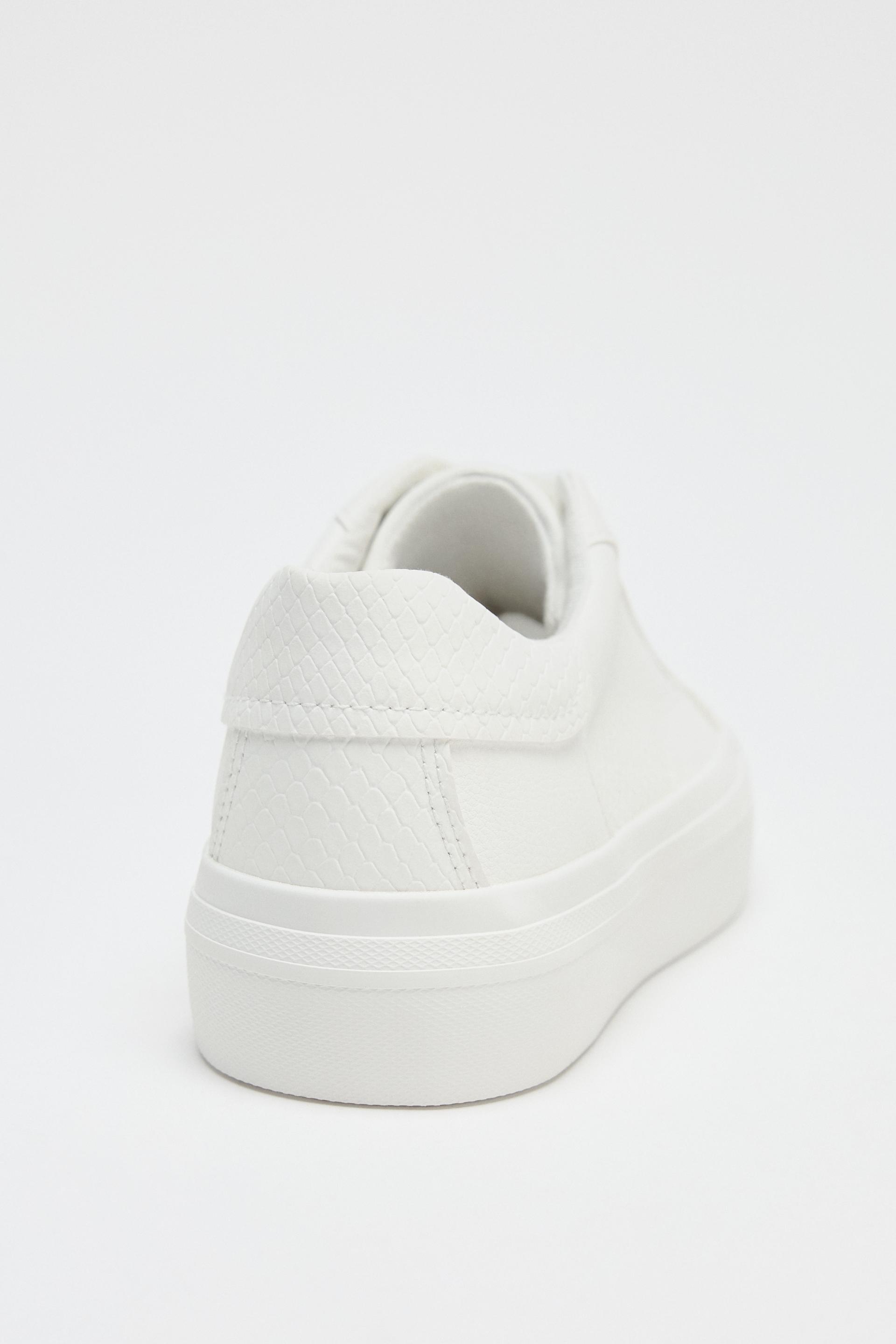 TEXTURED TRAINERS