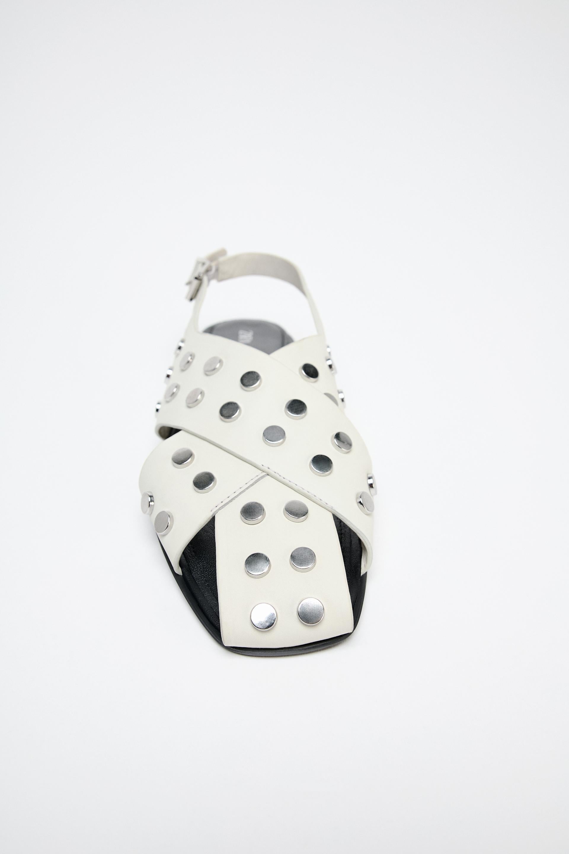 FLAT LEATHER CAGE SANDALS WITH STUDS