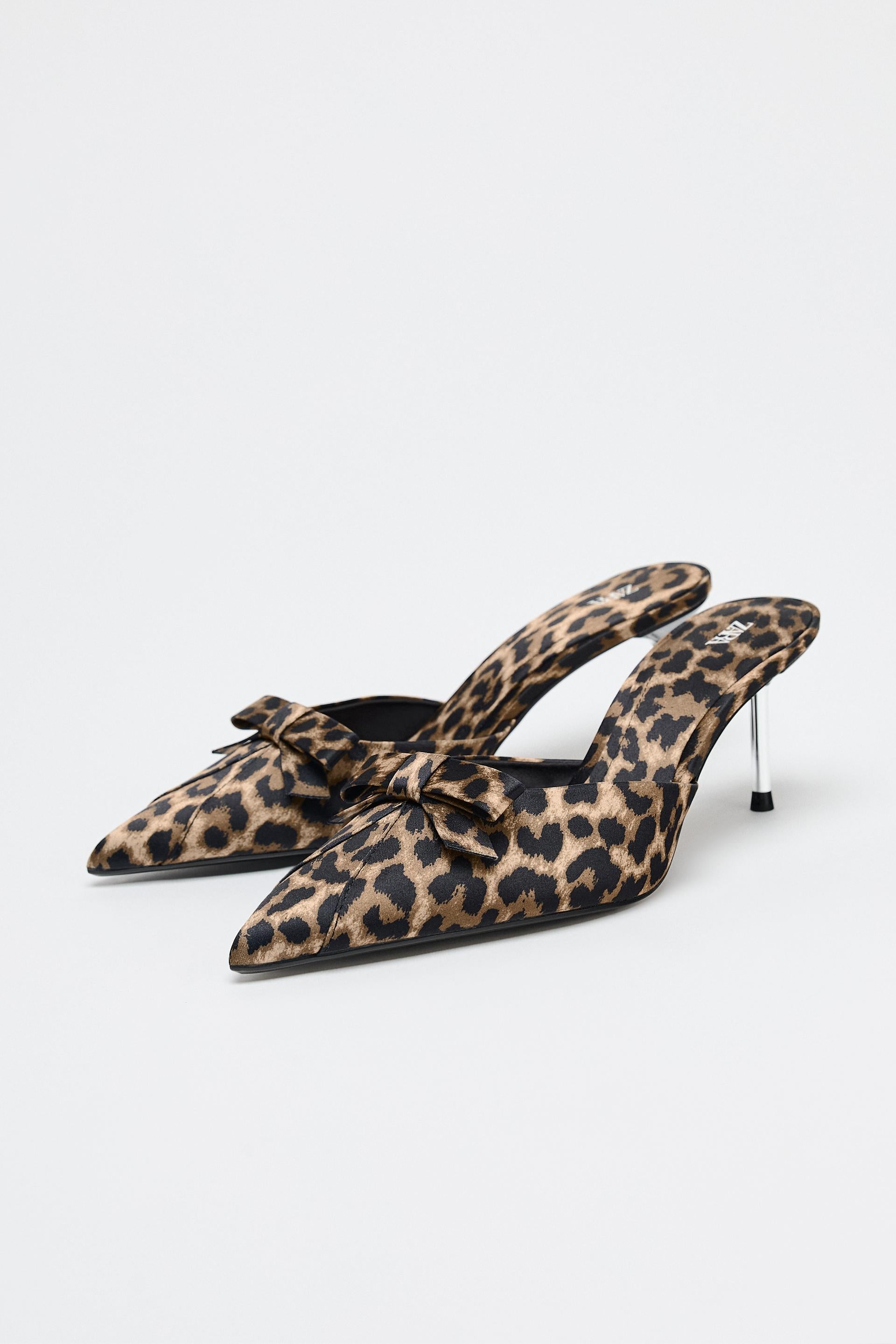 ANIMAL PRINT BOW HEELED MULES